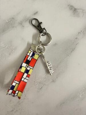 אקססורי צ׳ארם חבל כתום חלום