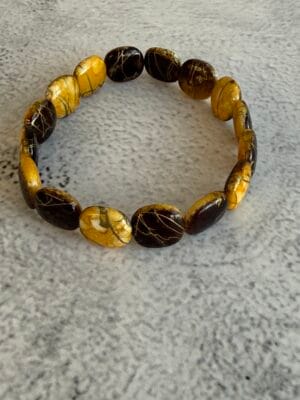 צמיד גמיש חרוזים שטוחים חום וצהוב